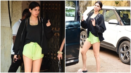 On Saturday, Khushi walked out of her Pilates class wearing a chic black and neon green athleisure look. It is setting incredible fitness fashion goals for us.(HT Photos/Varinder Chawla)