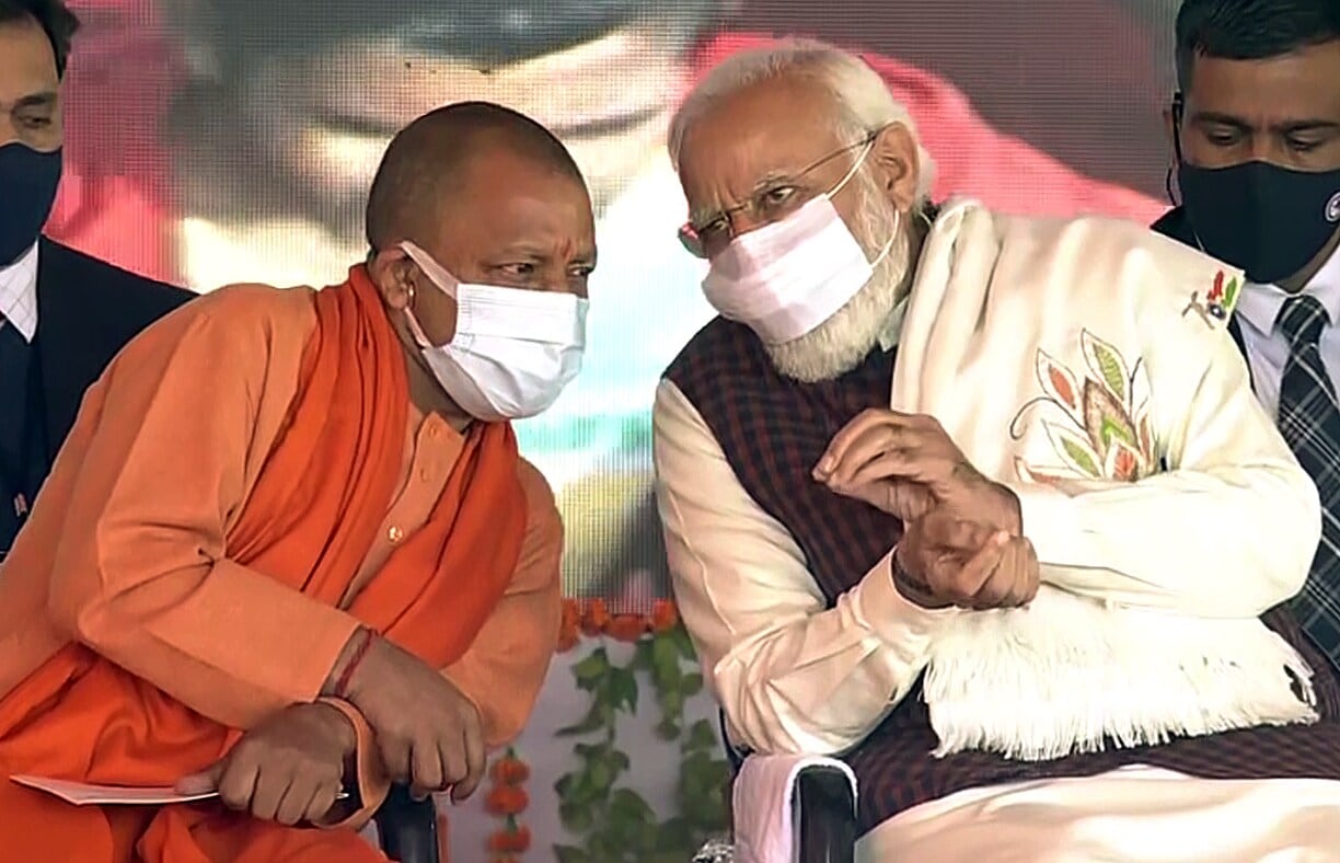 PM Modi interacts with Uttar Pradesh chief minister Yogi Adityanath at the foundation stone laying ceremony of Ganga Expressway in Shahjahanpur. (ANI Photo) PM Modi interacts with Uttar Pradesh chief minister Yogi Adityanath at the foundation stone laying ceremony of Ganga Expressway in Shahjahanpur. (ANI Photo)