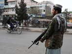 A Taliban fighter stands guard in Kabul, Afghanistan. REUTERS/Ali Khara