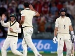 Australia's Mitchell Starc, center, celebrates after taking the wicket of England's Joe Root, right, during the fourth day of their Ashes cricket test match in Adelaide, Australia, Sunday, Dec. 19, 2021. (AP) Australia's Mitchell Starc, center, celebrates after taking the wicket of England's Joe Root, right, during the fourth day of their Ashes cricket test match in Adelaide, Australia, Sunday, Dec. 19, 2021. (AP)
