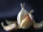 A video of the incident circulating on social media showed people standing around the burning heap of garlic and shouting patriotic slogans. (Representational image)(Unsplash)