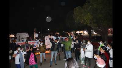 Nurses from various government hospitals of Chandigarh holding a protest against the Punjab government at the Sector-17 Plaza in Chandigarh on Sunday. (HT Photo)