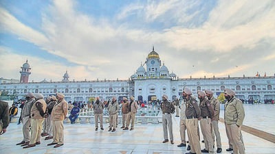 Police at Golden Temple ahead of Punjab chief minister Charanjit Singh Channi's visit, in Amritsar, on Sunday. (PTI) Police at Golden Temple ahead of Punjab chief minister Charanjit Singh Channi's visit, in Amritsar, on Sunday. (PTI)