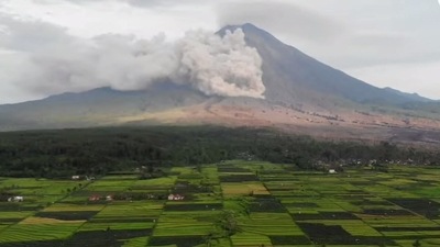A drone view shows smoke and ash rising from side of Semeru volcano, in Lumajang, East Java, Indonesia. (PEDULI MUSLIM via REUTERS)