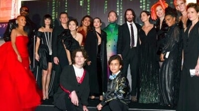 The cast of The Matrix Resurrections pose with director Lana Wachowski, fourth from right, at the premiere of the film at the Castro Theatre in San Francisco. The film will release on December 22. (Jose Carlos Fajardo/Bay Area News Group via AP) (AP) The cast of The Matrix Resurrections pose with director Lana Wachowski, fourth from right, at the premiere of the film at the Castro Theatre in San Francisco. The film will release on December 22. (Jose Carlos Fajardo/Bay Area News Group via AP) (AP)