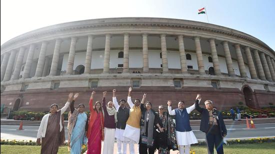 Suspended Rajya Sabha MPs during a protest demanding for revocation of their suspension, at Parliament House, in New Delhi on December 17. (PTI) Suspended Rajya Sabha MPs during a protest demanding for revocation of their suspension, at Parliament House, in New Delhi on December 17. (PTI)