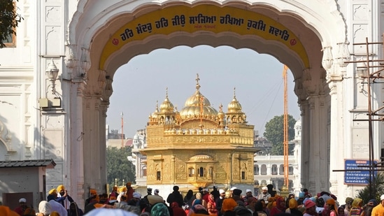 Sikh devotees arrive to pay respect at the Golden Temple in Amritsar.&nbsp;(AFP Photo)