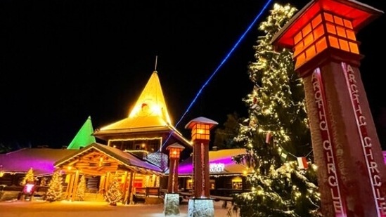 The Santa Claus Village tourist attraction lit with festive lights early in the morning in Rovaniemi, Finland. Finnish Lapland’s Christmas season is in full swing with operators reporting about 80% of 2019 visitor levels, which turned out to be a record-breaking year.&nbsp;(AP Photo/James Brooks)