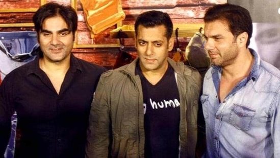 Arbaaz Khan poses with Salman Khan and Sohail Khan.