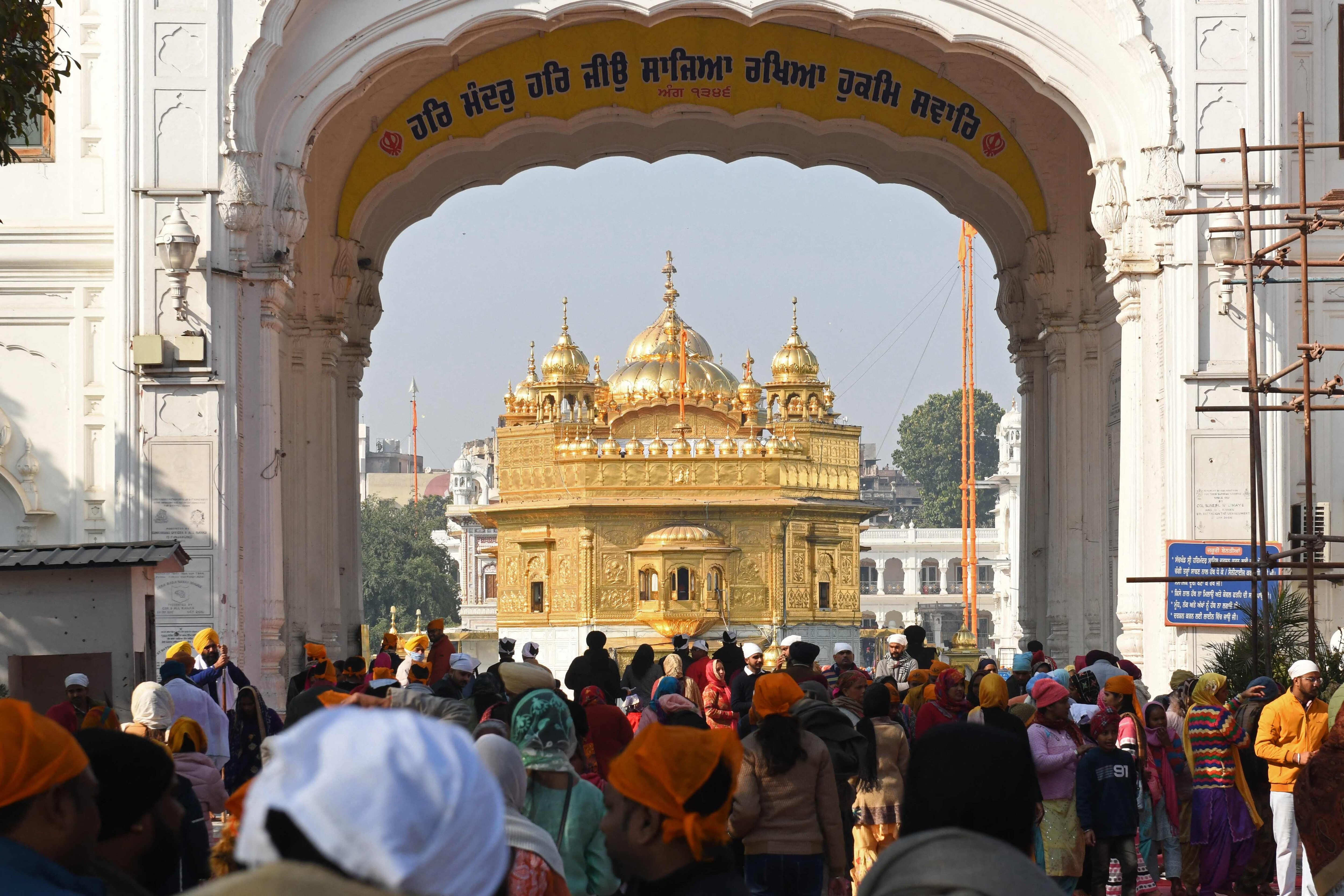 Sikh devotees arrive to pay respect at the Golden Temple in Amritsar. (AFP Photo) Sikh devotees arrive to pay respect at the Golden Temple in Amritsar. (AFP Photo)