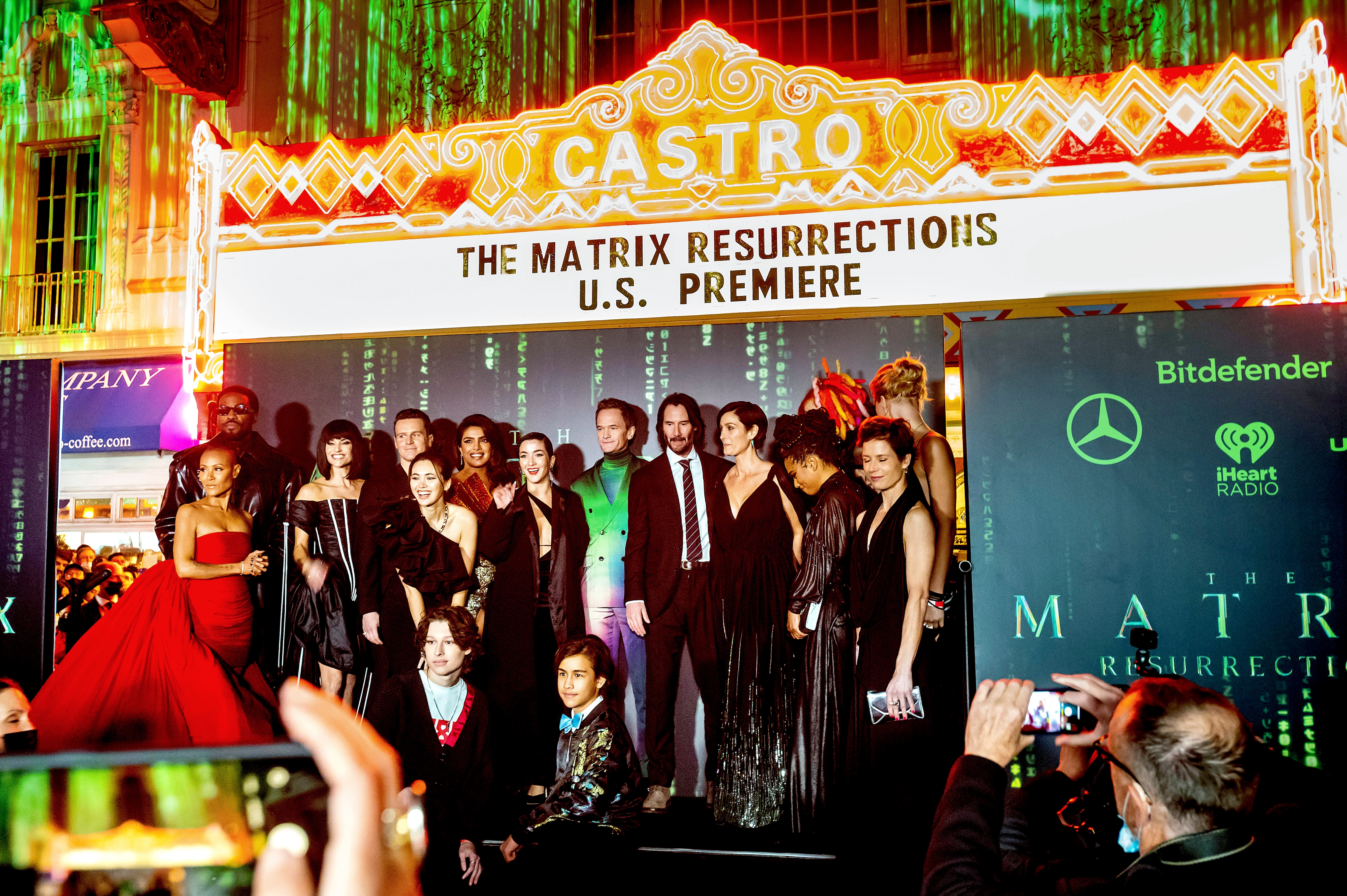 Cast members stand for photos outside the premiere of The Matrix Resurrections on Saturday at the Castro Theatre in San Francisco. (AP Photo/Noah Berger) (AP) Cast members stand for photos outside the premiere of The Matrix Resurrections on Saturday at the Castro Theatre in San Francisco. (AP Photo/Noah Berger) (AP)