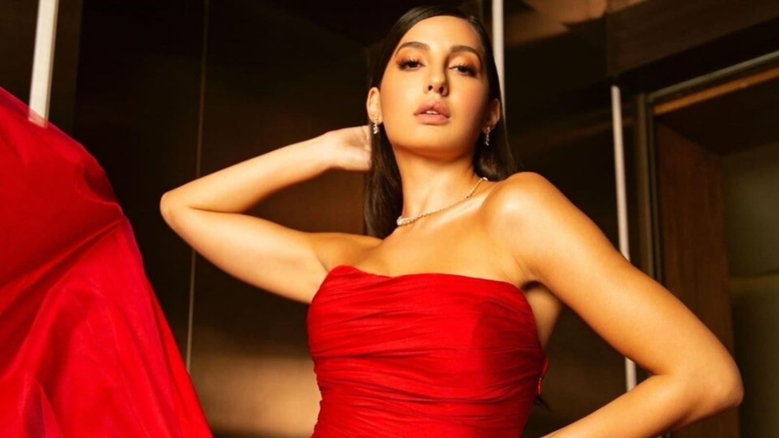 Nora Fatehi Drops A Romantic Look In Eye Catching Red Dress Worth ₹80k