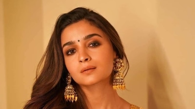 Alia Bhatt who plays the role of Sita in RRR, donned a golden ensemble by Sabyasachi Mukherjee at the event. (Instagram)