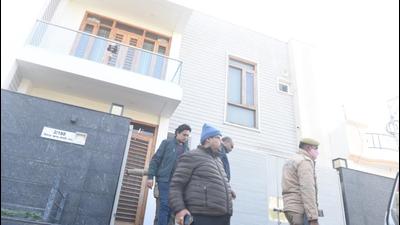 Income tax officials emerge from a house during a survey in Lucknow. (FILE PHOTO) Income tax officials emerge from a house during a survey in Lucknow. (FILE PHOTO)