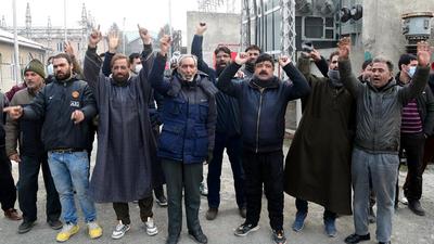 Jammu and Kashmir Power development department employees protest against the government's power privatisation move, in Srinagar on Monday. People’s Democratic Party president Mehbooba Mufti connected the issue with the Centre’s decision of revocation of Article 370. (ANI) Jammu and Kashmir Power development department employees protest against the government's power privatisation move, in Srinagar on Monday. People’s Democratic Party president Mehbooba Mufti connected the issue with the Centre’s decision of revocation of Article 370. (ANI)