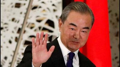 China's State Councillor and Foreign Minister Wang Yi waves as he leaves a news conference in Tokyo, Japan. (REUTERS/FILE) China's State Councillor and Foreign Minister Wang Yi waves as he leaves a news conference in Tokyo, Japan. (REUTERS/FILE)