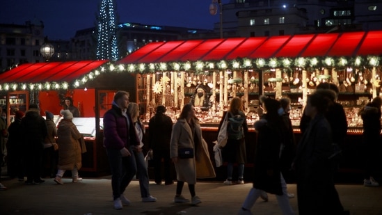 People visit a Christmas market in London, Britain(REUTERS)