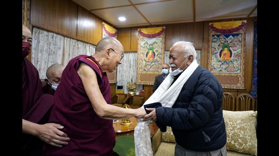 RSS chief Mohan Bhagwat with Tiebtan spiritual leader the Dalai Lama at McLeodganj on Monday. (HT Photo)