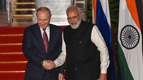 Prime Minister Narendra Modi greets Russian president Vladimir Putin before a meeting at Hyderabad House in New Delhi.(AFP)