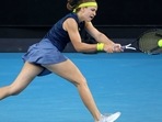 Czech Republic's Karolina Muchova hits a return against Belgium's Elise Mertens Czech Republic's Karolina Muchova hits a return against Belgium's Elise Mertens