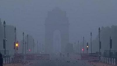 The India Gate is barely visible due to smog in New Delhi on Monday. (ANI)