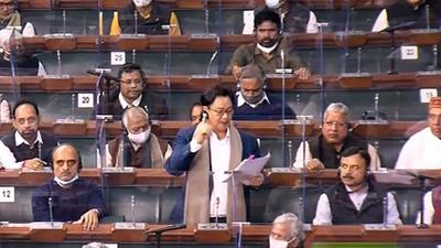 Union law minister Kiren Rijiju speaks in the Lok Sabha during the winter session of Parliament in New Delhi on Monday. (PTI) Union law minister Kiren Rijiju speaks in the Lok Sabha during the winter session of Parliament in New Delhi on Monday. (PTI)