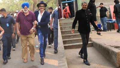 Ranveer Singh with Balwinder Singh Sandhu, who also coached them for 83. Ranveer plays the role of Kapil Dev, who attended the event in an all-black outfit. (Varinder Chawla) Ranveer Singh with Balwinder Singh Sandhu, who also coached them for 83. Ranveer plays the role of Kapil Dev, who attended the event in an all-black outfit. (Varinder Chawla)