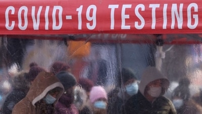 People queue to be tested for COVID-19 in Times Square, as the Omicron coronavirus variant continues to spread in Manhattan, New York City, US (REUTERS)