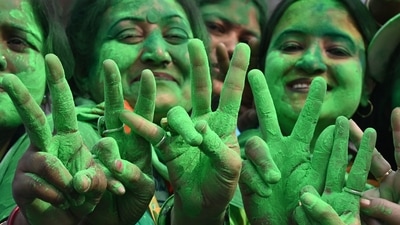 Trinamool Congress (TMC) supporters on Tuesday celebrated the party's victory in the Kolkata Municipal Corporation (KMC) elections, near West Bengal Chief Minister and TMC leader Mamata Banerjee's residence in Kolkata. (AFP) Trinamool Congress (TMC) supporters on Tuesday celebrated the party's victory in the Kolkata Municipal Corporation (KMC) elections, near West Bengal Chief Minister and TMC leader Mamata Banerjee's residence in Kolkata. (AFP)