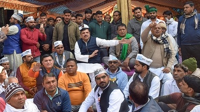 Noida: AAP MP Sanjay Singh meets the farmers protesting at Noida Authority, Monday. (PTI) Noida: AAP MP Sanjay Singh meets the farmers protesting at Noida Authority, Monday. (PTI)