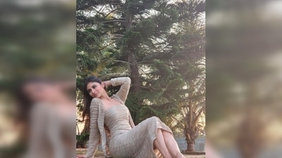 The Bengali beauty flaunts her curves as she strikes poses on the grass. (Instagram/@imouniroy) The Bengali beauty flaunts her curves as she strikes poses on the grass. (Instagram/@imouniroy)
