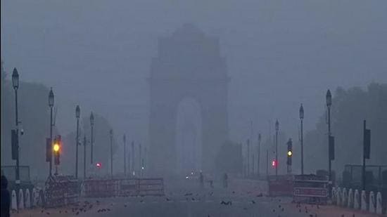 The India Gate is barely visible due to smog in New Delhi on Monday. (ANI)