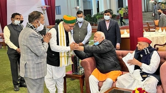 An image of the gathering shared by the Congress’ UP unit showed Mulayam Singh Yadav and Mohan Bhagwat sitting together and the latter blessing Union minister Arjun Meghwal. (Congress Twitter)