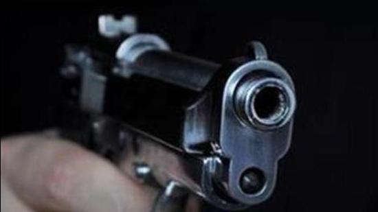 Shooting a gun in night (Getty Images/iStockphoto)