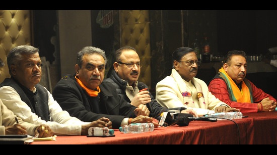 Senior BJP leaders addressing a press conference on the final day of campaigning for the Chandigarh civic body elections on Tuesday. (Keshav SIngh/HT)