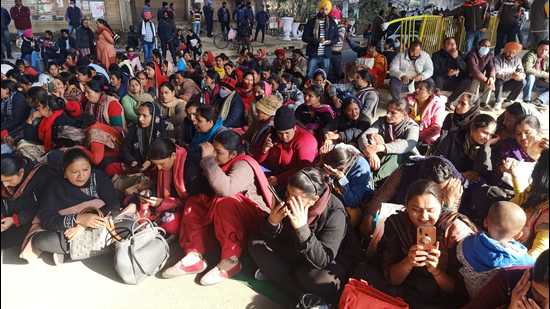 Members of the Anganwadi Employees Union, Punjab, and contractual teachers blocking Kharar highway in Mohali during their protest for regular jobs on Tuesday. (HT Photo)