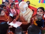 Prime Minister Narendra Modi interacting with women beneficiaries at a function, in Prayagraj on December 21, 2022. (ANI Photo) Prime Minister Narendra Modi interacting with women beneficiaries at a function, in Prayagraj on December 21, 2022. (ANI Photo)