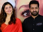 Alia Bhatt and NTR Jr pose for the photo at the trailer launch of their upcoming movie RRR.(Sunil Khandare) Alia Bhatt and NTR Jr pose for the photo at the trailer launch of their upcoming movie RRR.(Sunil Khandare)