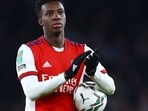 Arsenal's Eddie Nketiah with the match ball celebrates after the match.