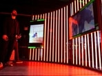 People look at non fungible token (NFT) art at Dreamverse, a public digital art experience featuring NFT artworks and artists in New York City, New York, US