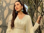 Karisma Kapoor blesses our week in white anarkali suit for new pics, Amrita Arora reacts Karisma Kapoor blesses our week in white anarkali suit for new pics, Amrita Arora reacts