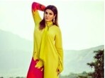Raveena Tandon, on Tuesday, drove our midweek blues away with a set of pictures of herself from one of her recent fashion photoshoots. For the pictures, Raveena ditched traditional attires to match the winter sun in shades of yellow. Raveena decked up in a sassy bright casual attire and posed by a pool of sorts.(Instagram/@officialraveenatandon)