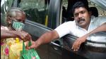 Polio-stricken, once Salim Kumar (38) gets into his specially-modified car with the help of two persons, he swifts away to reach the needy. (HT) Polio-stricken, once Salim Kumar (38) gets into his specially-modified car with the help of two persons, he swifts away to reach the needy. (HT)