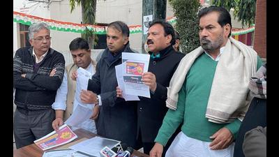 Congress leaders holding a press conference regarding the pre-poll survey in Chandigarh on Wednesday. (HT Photo)