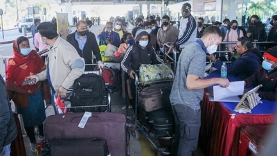 Checking of vaccine certificate going on at Birsa Munda International Airport, in Ranchi amid Omicron threat. (PTI) Checking of vaccine certificate going on at Birsa Munda International Airport, in Ranchi amid Omicron threat. (PTI)