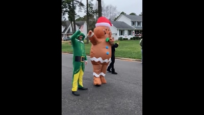 These parents dressed up as Gingerbread man and an elf to welcome their daughter back from school for Christmas. (reddit/@vab0618) These parents dressed up as Gingerbread man and an elf to welcome their daughter back from school for Christmas. (reddit/@vab0618)