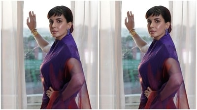 Kirti teamed the purple and red silk organza saree with a turtleneck purple blouse with short sleeves. (Instagram/@iamkirtikulhari)