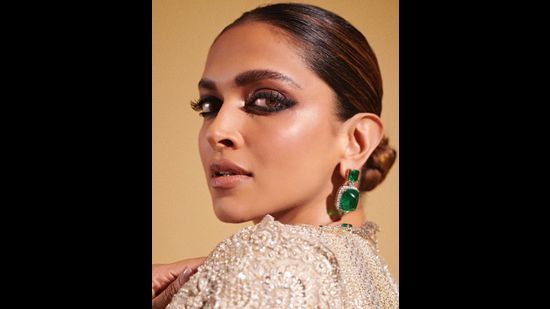 Deepika Padukone’s dark rimmed eyes go perfectly with the snatched bun. (Photo: Instagram)