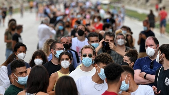 In this file photo taken on July 7, 2021 people over 40 years old, wearing a protective face mask, queue to receive a dose of J&J/Janssen Covid-19 vaccine in an itinerant vaccination truck.(AFP) In this file photo taken on July 7, 2021 people over 40 years old, wearing a protective face mask, queue to receive a dose of J&J/Janssen Covid-19 vaccine in an itinerant vaccination truck.(AFP)