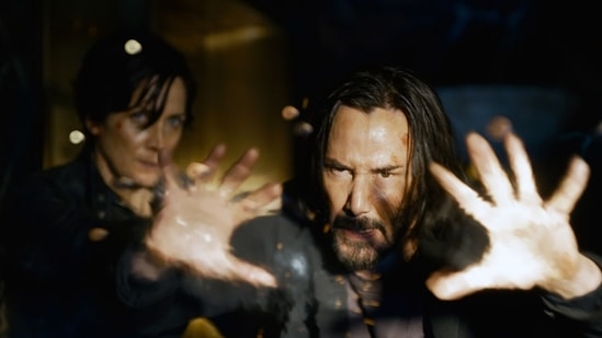 The Matrix Resurrections review: Keanu Reeves and Carrie Anne Moss in the movie.